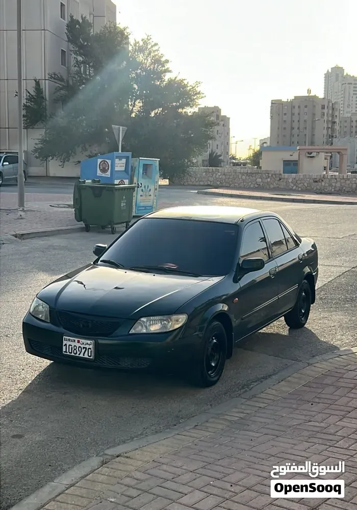 Mazda 323 2003 photo 3