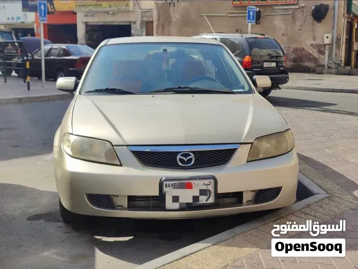 Mazda 323 2003 photo 5
