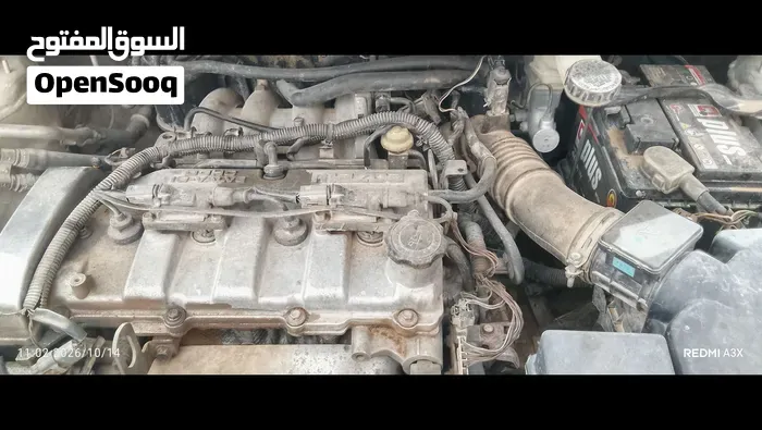 Mazda 323 2002 photo 2