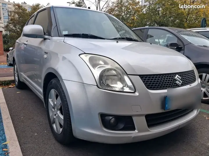 Suzuki Swift 2010 photo 2