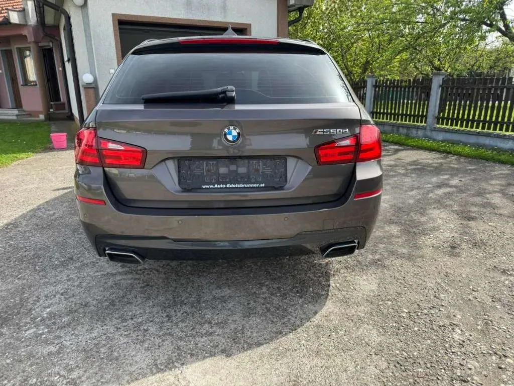 BMW 5 Series 2011 photo 2