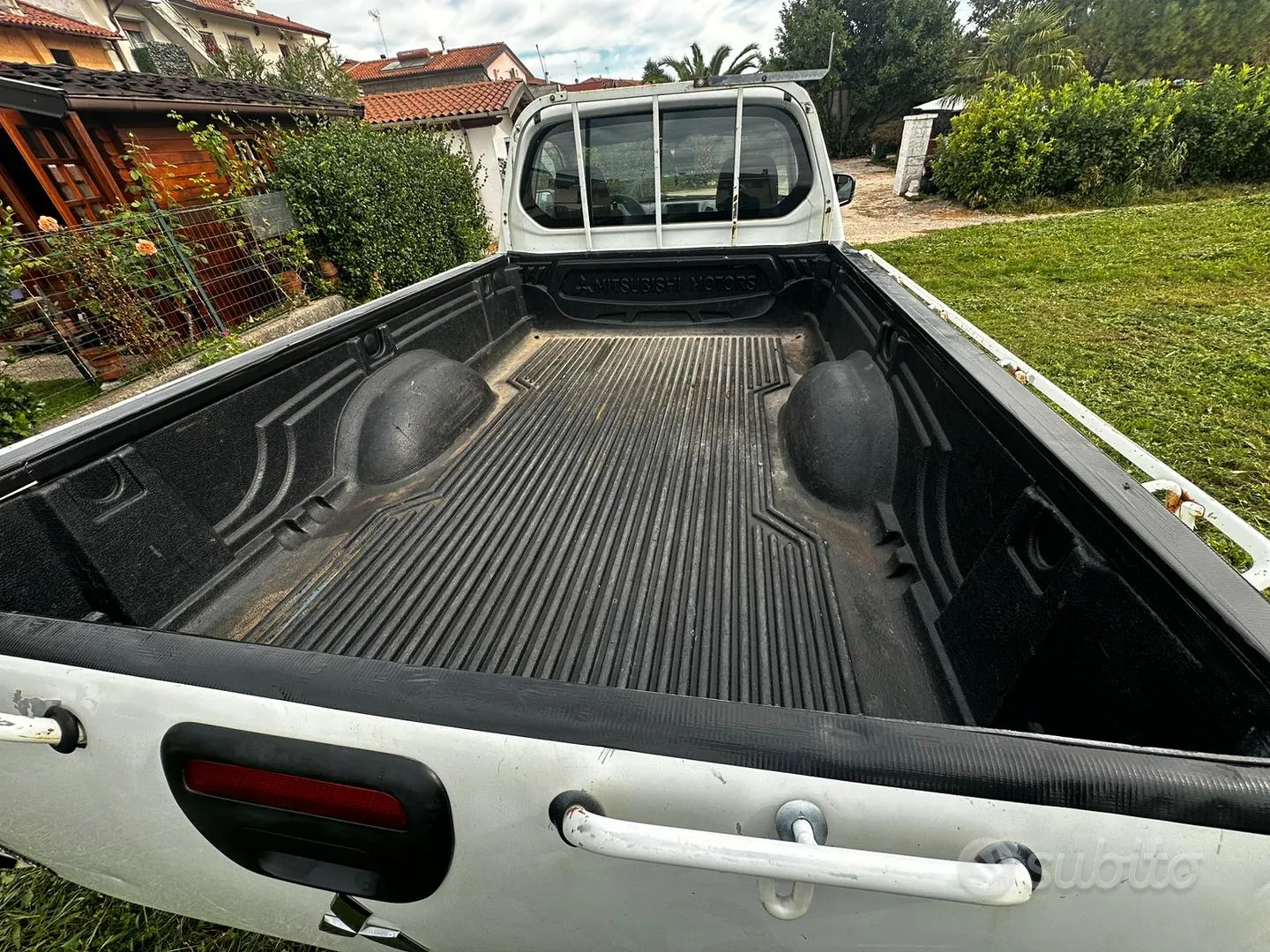 Mitsubishi L200 2013 photo 4