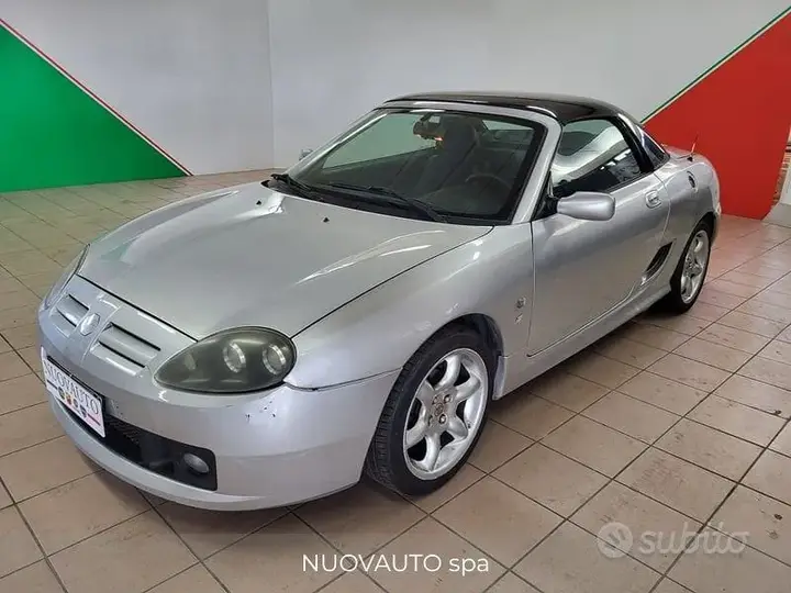 MG Tf