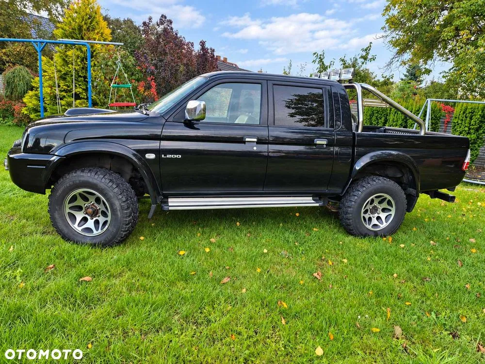 Mitsubishi L200 2002 photo 2