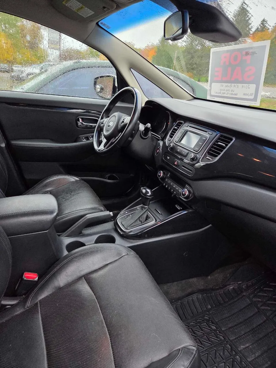 Kia Rondo 2014 photo 4