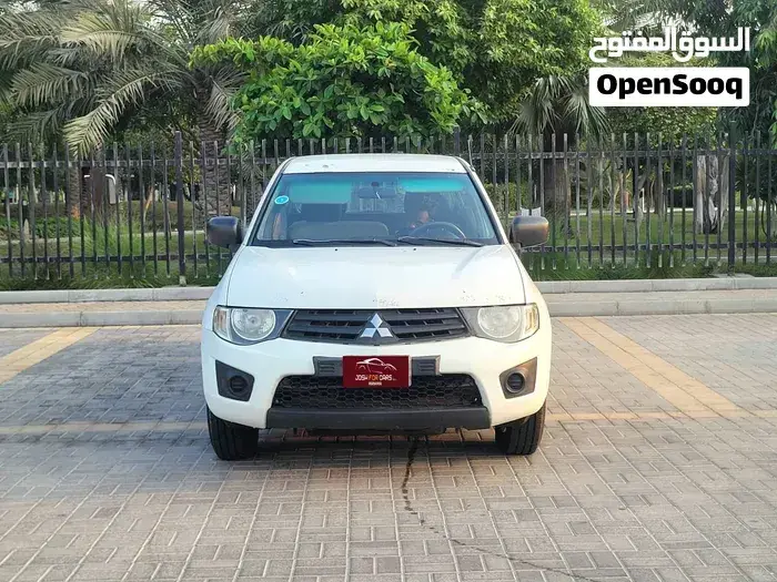 Mitsubishi L200 2014 photo 2