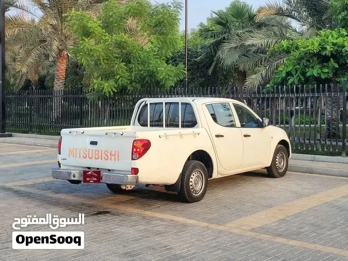 Mitsubishi L200 2014 photo 4