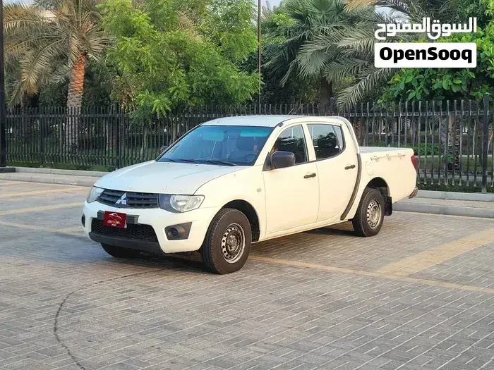 Mitsubishi L200 2014 photo 3