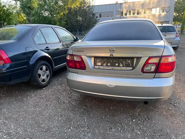 Nissan Almera 2004 photo 2