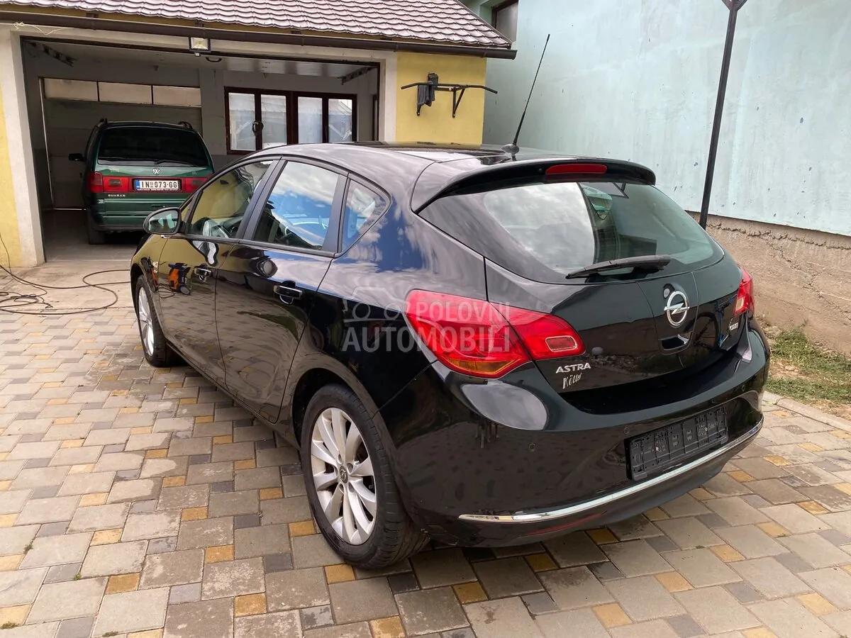 Opel Astra J 2013 photo 5