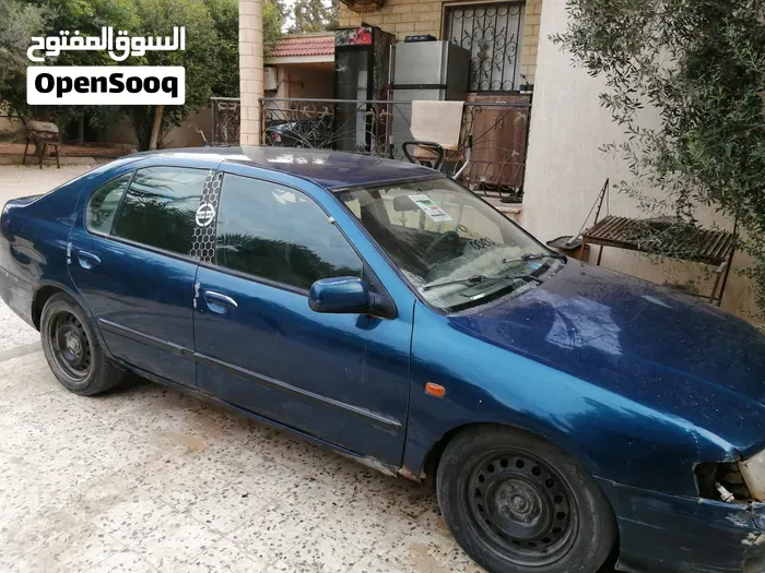 Nissan Primera 1998 photo 4