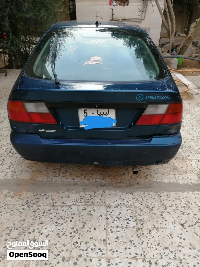 Nissan Primera 1998 photo 2