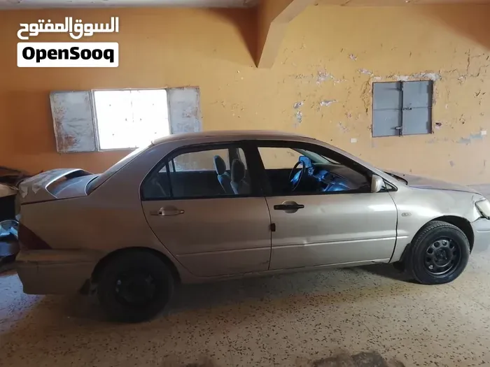 Mitsubishi Lancer 2002 photo 2