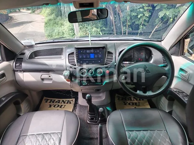 Mitsubishi L200 2011 photo 3
