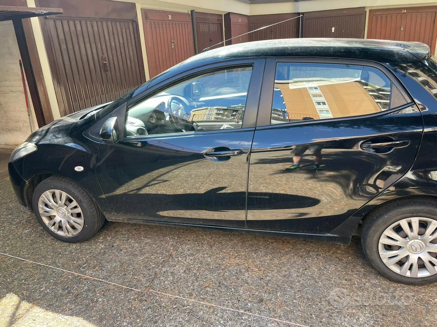 Mazda 2 2009 photo 3