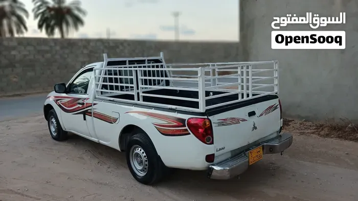 Mitsubishi L200 2009 photo 2