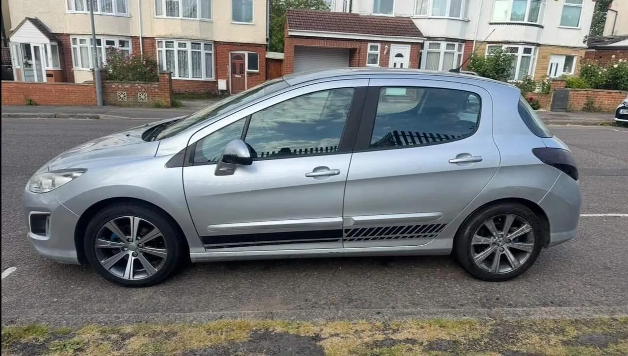 Peugeot 308 2013 photo 5