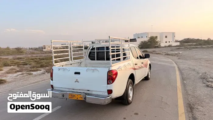 Mitsubishi L200 2011 photo 4
