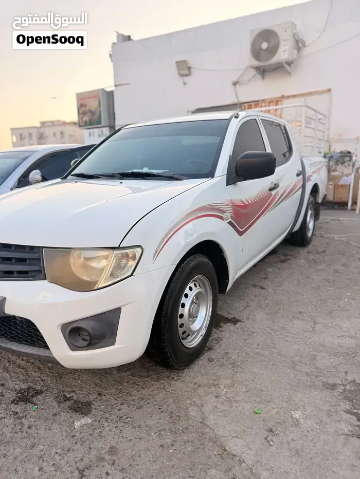 Mitsubishi L200 2011 photo 3