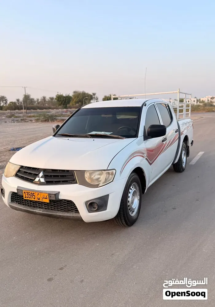 Mitsubishi L200 2011 photo 2