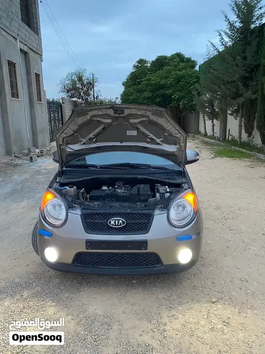 Kia K5 2008 photo 2