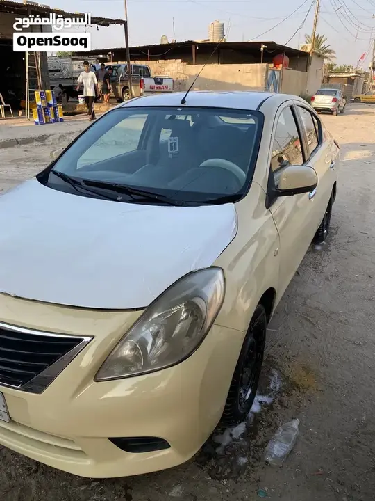 Nissan Sunny 2014 photo 2