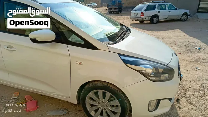Kia Carens 2014 photo 4