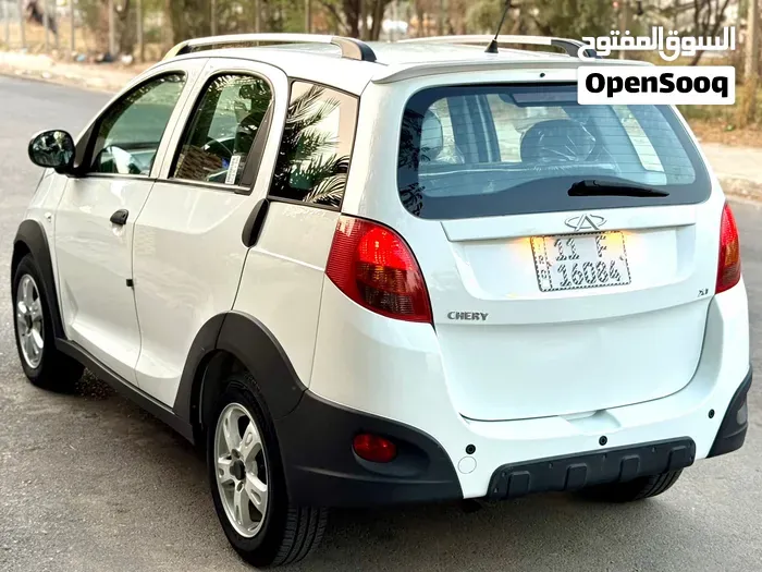 Chery X1 2014 photo 3