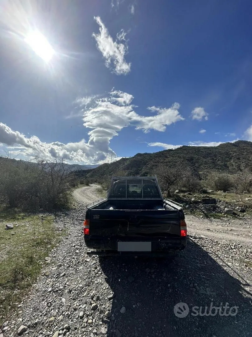 Mitsubishi L200 2001 photo 2