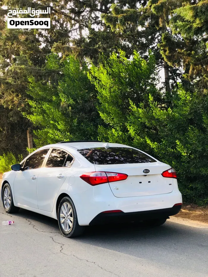 Kia K3 2014 photo 3