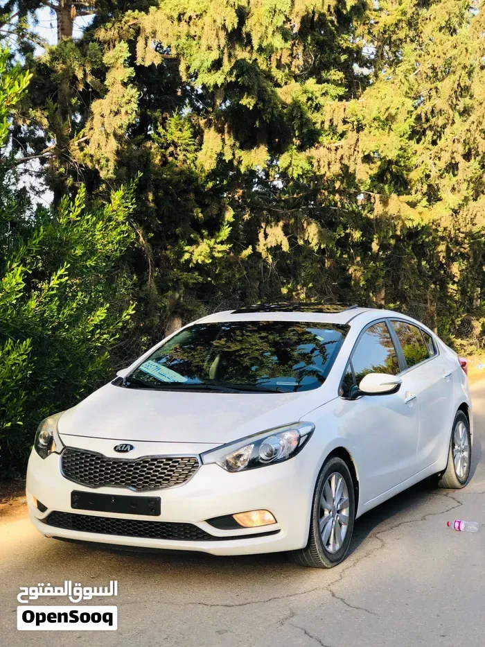 Kia K3 2014 photo 2