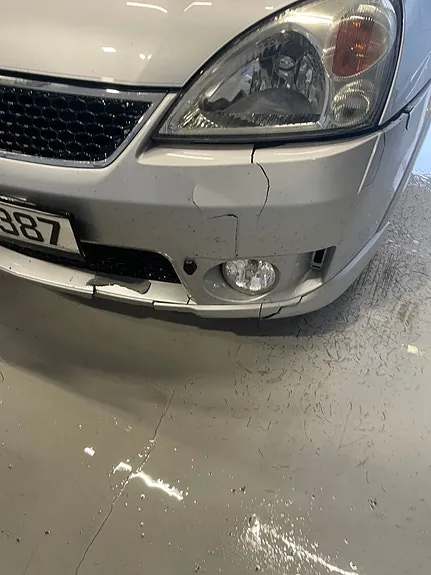 Suzuki Liana 2005 photo 4