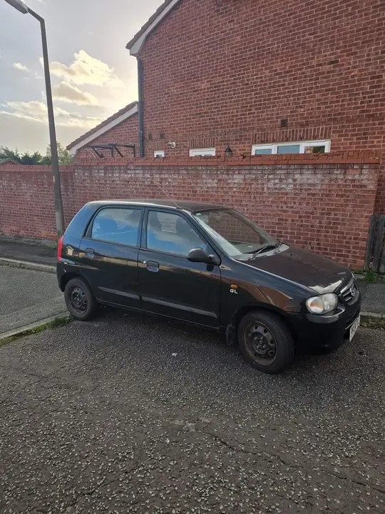 Suzuki Alto 2004 photo 4