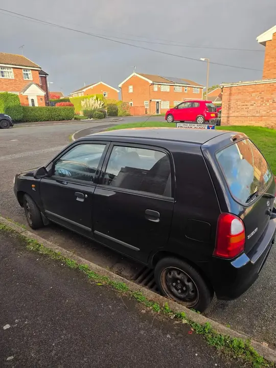 Suzuki Alto 2004 photo 2