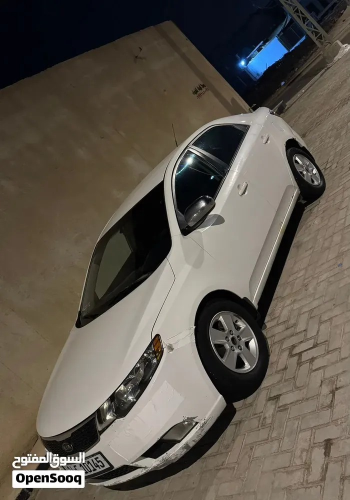 Kia Cerato 2012 photo 2