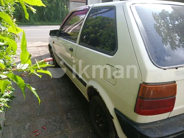 Nissan March 1998 photo 3