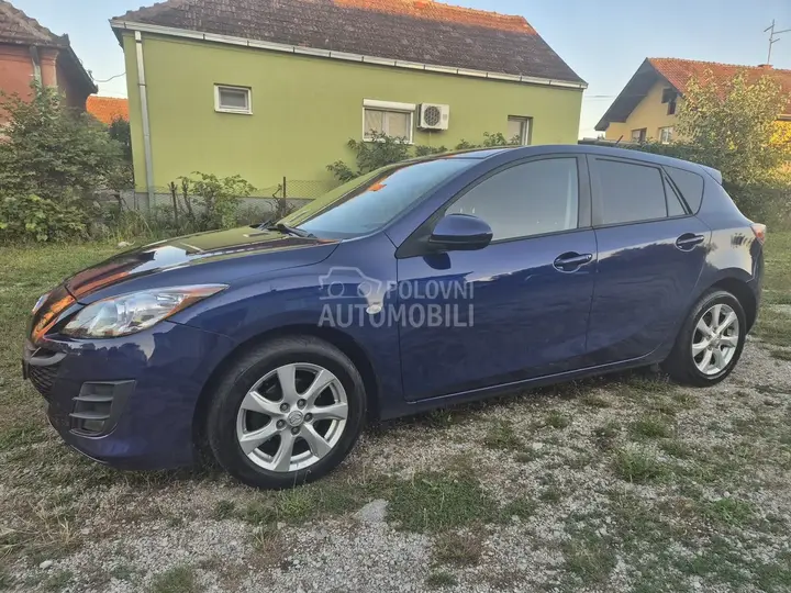 Mazda 3 2011 photo 2