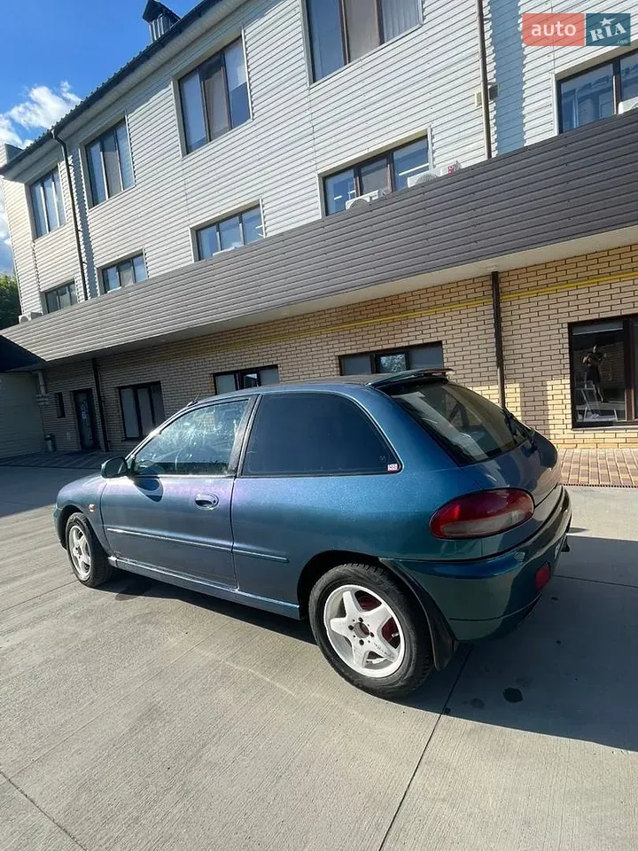 Mitsubishi Colt 1995 photo 2