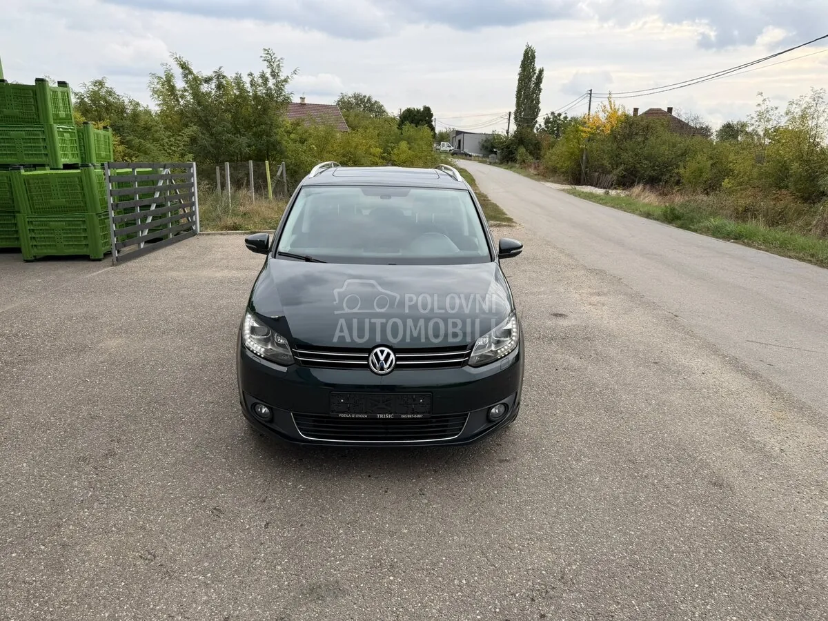 Volkswagen Touran 2012 photo 2