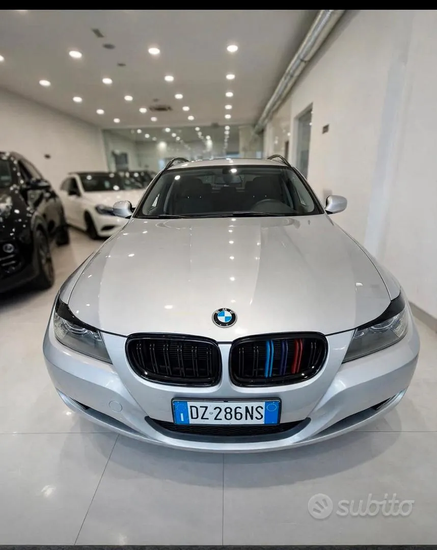 BMW 320D 2009 photo 2