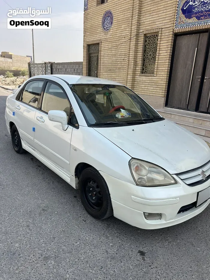 Suzuki Liana 2005 photo 2