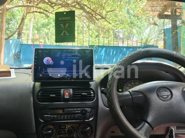 Nissan Sunny 2002 photo 4