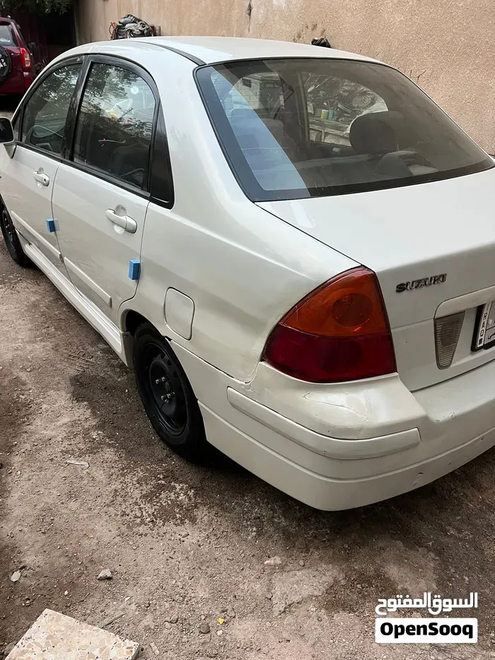 Suzuki Liana 2005 photo 4