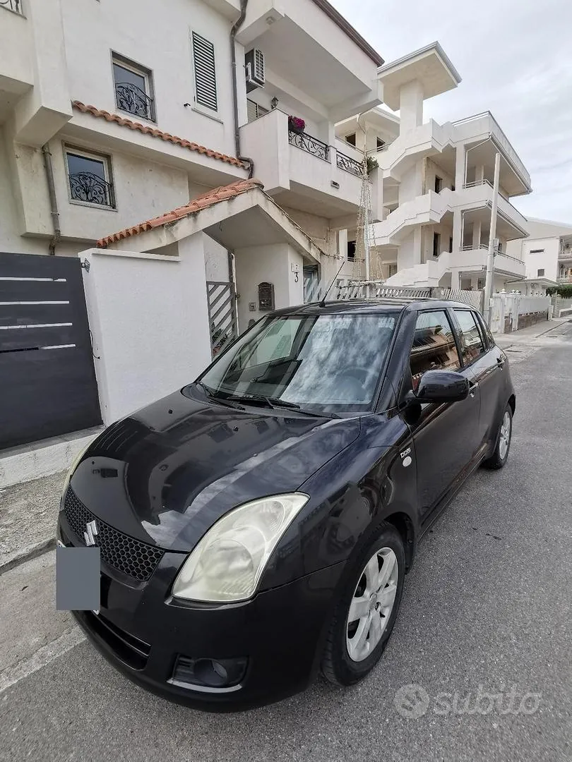 Suzuki Swift 2009 photo 2