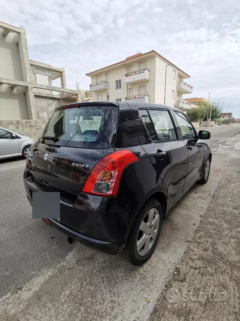 Suzuki Swift 2009 photo 3