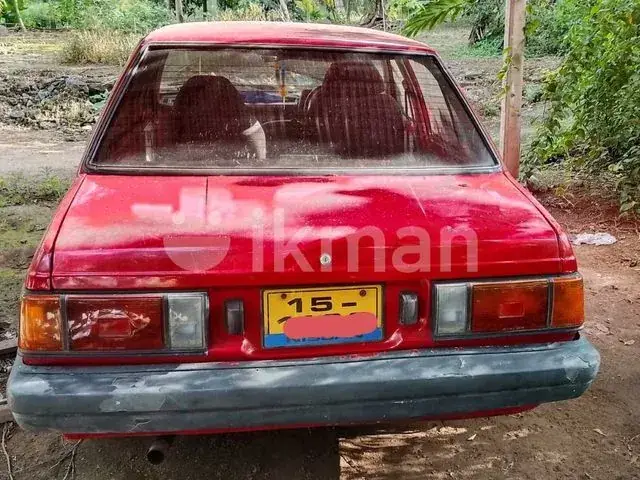 Nissan B11 1985 photo 3