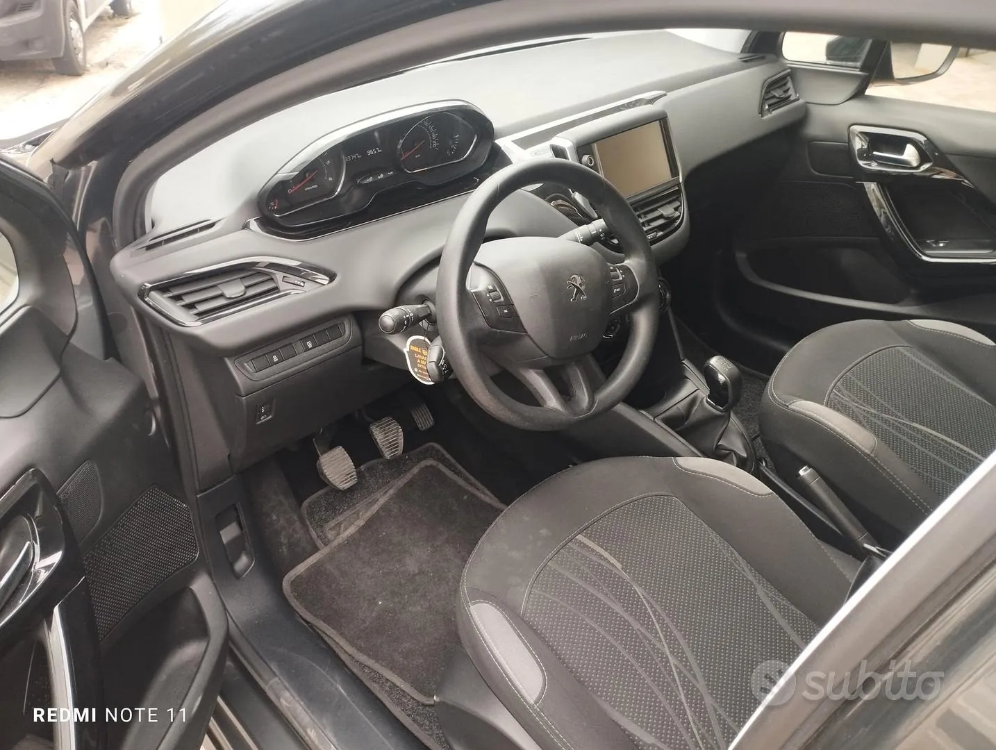 Peugeot 208 2014 photo 4