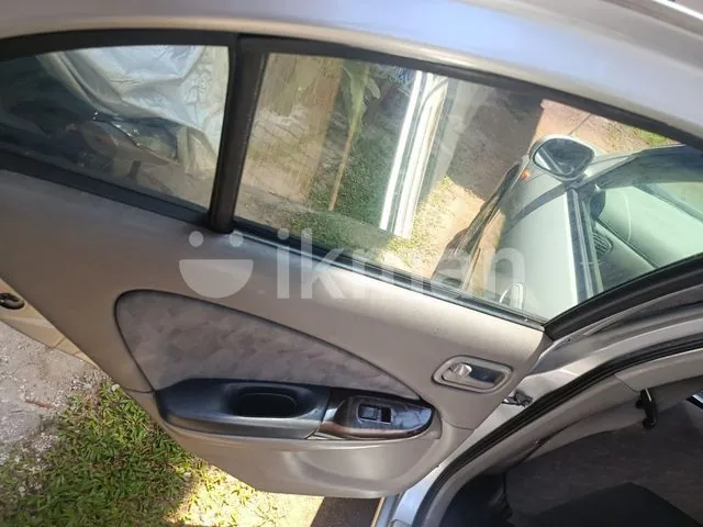 Nissan Sunny 2004 photo 3