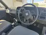 Mazda 2 1999 photo 2