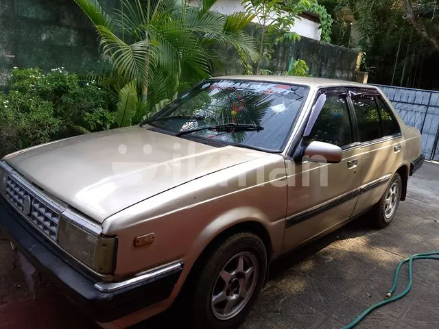 Nissan B11 1984 photo 4
